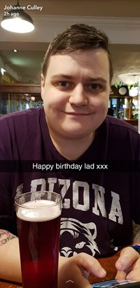 On his birthday having a pint! 