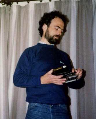 John Love May 1984 choosing a cassette (!) to play.