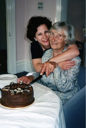 Jo and Joyce with a chocolate cake