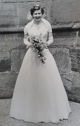 As a bridesmaid, before being bride herself (1959 or earlier?)