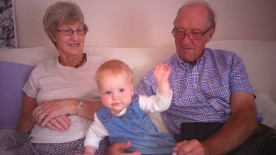 Grandma and Grandad with Rose as a baby 