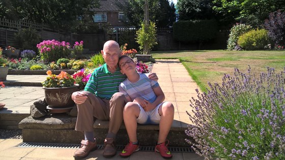 Dad and Grandson in his prized garden