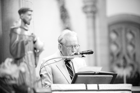 Dad reading at Mary's wedding