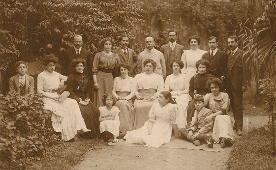 Mariusa's mother (seated second from right in white) and Family