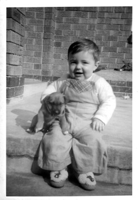 Baby Mark Melchior aged 11 months..Puppy is Mandy