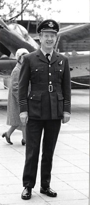 Wing Commander Turner at ease (is that the Queen sneaking behind?)
