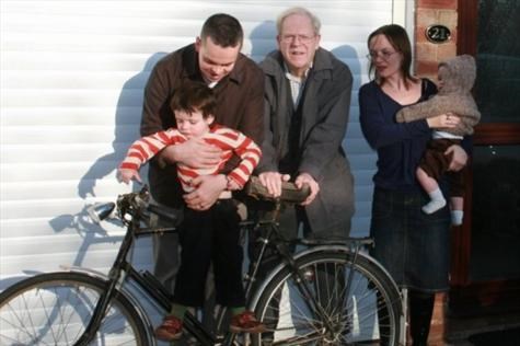 John with David, Sue, Edward and Dylan - and his trusty bike