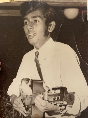 With his first love - the guitar!