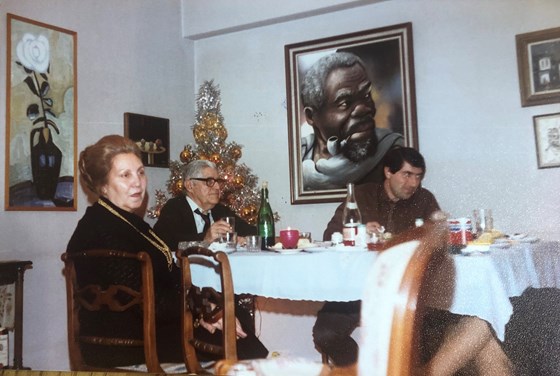 Menos with his parents at Christmas