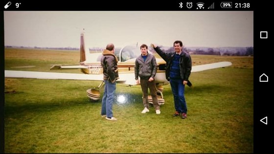 Dad with his friends and his plane