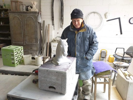 Sending condolences to you all. Many fond memories of Derek. This is a carving of beloved Jake which Derek kindly carved for us. 