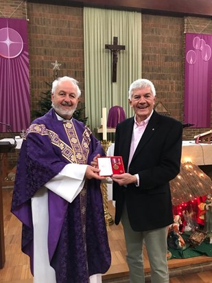 John receiving the Fideliter Servienti from Fr Doug in December 21