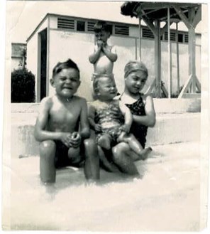 Southwark Park Lido. L-R: John, Peter, Anne, Pat. Vivid memories of being allowed to go with John and Peter to Southwark Park Lido on opening days in Spring, once I was older. We were tough in those days - it was freezing!