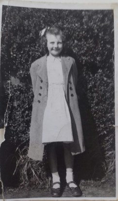 11 years old outside primary school, newspaper in front of shoes as they were to big...the old days.