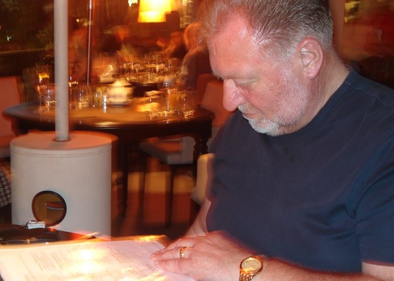 Dad on holiday in Portugal 2012 viewing the menu .... One of his favourite pastimes!