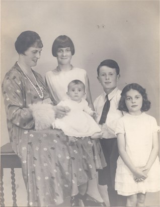 Granny Belle with Julie on her lap, Jean, John and Mary. 1930.