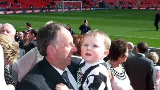 With Grandson Ethan at the football xx