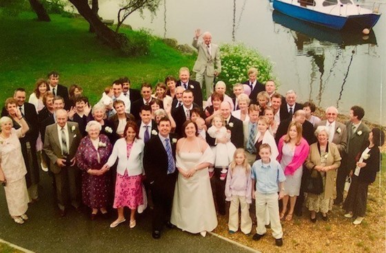 Stan standing on a huge boulder at our wedding - June 2003