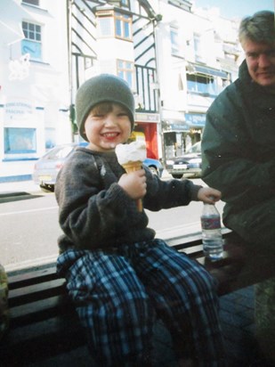 Enjoying an ice cream in Brixham. Aged about 5