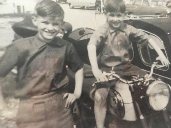 Baz driving his Dad’s motorbike..!! With his Brother John 