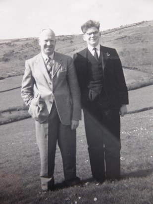 John in his Truro School Uniform with his father