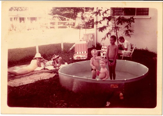 Cliffy Cooling off in the Pool - Freda to the left with Mike in the background 