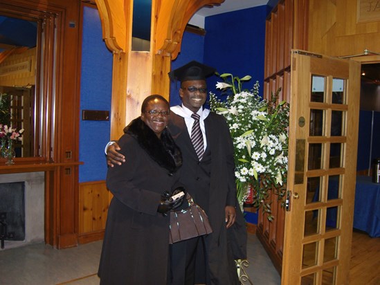 Tinu proudly posing with Yinka on his LLM graduation in Aberdeen