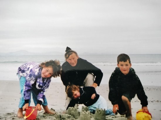 Mum visiting New Zealand, spending a cold day building sand castles at the beach with Holly, Lucy and Alex xF1 C275 4B25 95DD 29F502D455DE