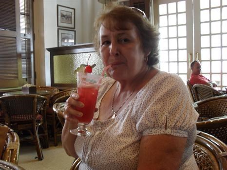 At last, my first Singapore Sling in Raffles Long bar. 