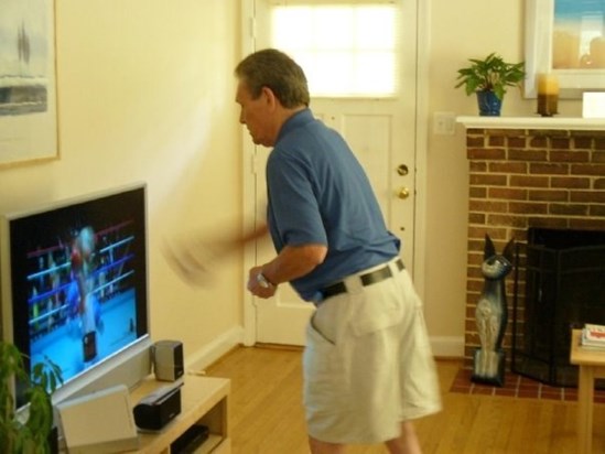 Dad trying the boxing game on the Wii  :) 