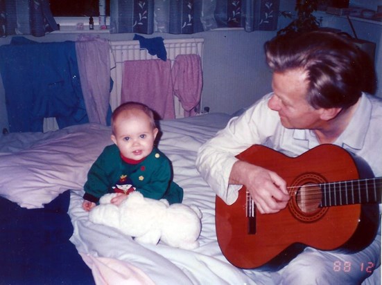 Lauren has the guitar played to her by Peter December 1988