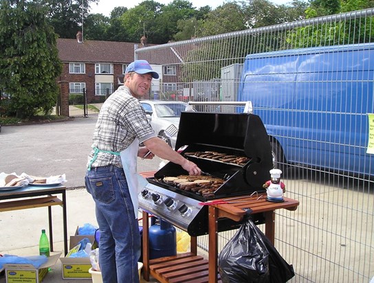 This Ronny on the BBQ at the school fete helping out as usual. Always there for people.