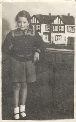 Pat and her dolls house 7 years old