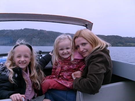 Nettie, Hannah and Abbie on a boat in Bowness water.