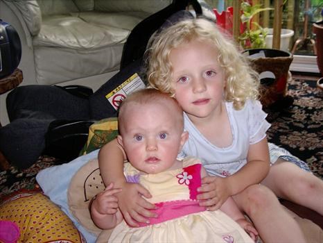 Hannah and Abbie in Nan and Grandad Narroway house 2004