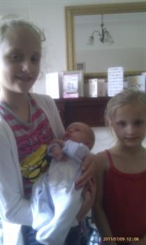 Hannah and Abbie with new cousin Jamie