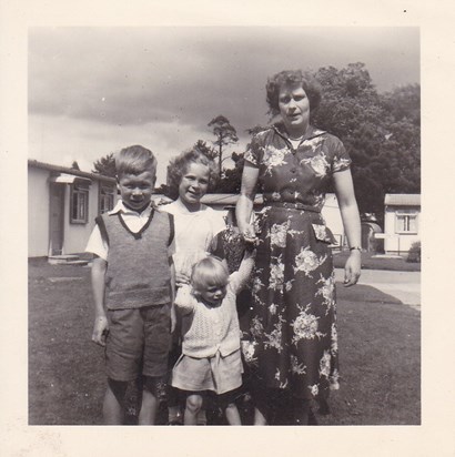 Pauline, with Graham, Janet and Trina outside no 23. Circa 1952