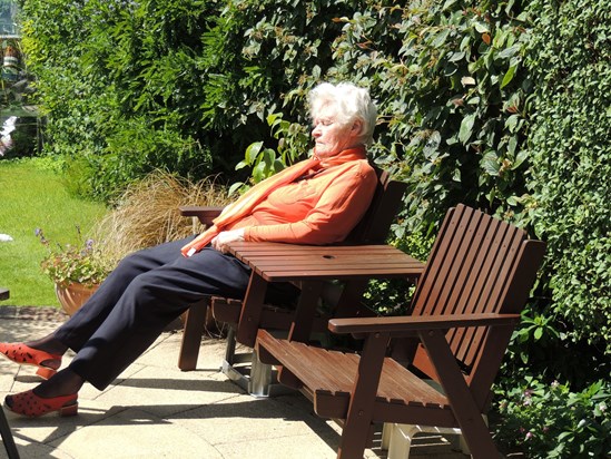 Mum enjoying the sun in Graham's garden. 2012