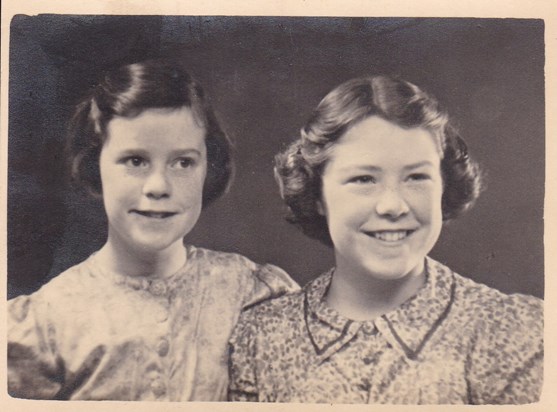 Pauline (right) with cousin Celia, as young ladies.