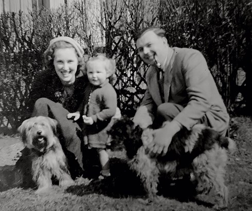 Philippa with mum Joyce, dad Paul and the dogs