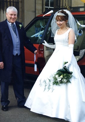 Dad on my wedding day. The car had to be a Range Rover!