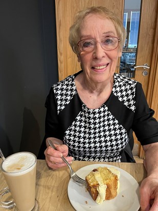 Enjoying her favourite coffee and cake!