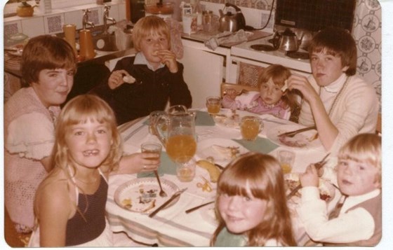 Claire at twin's christening with her cousins.