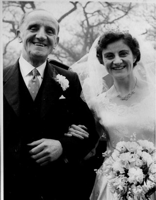 With her adored father on her wedding day