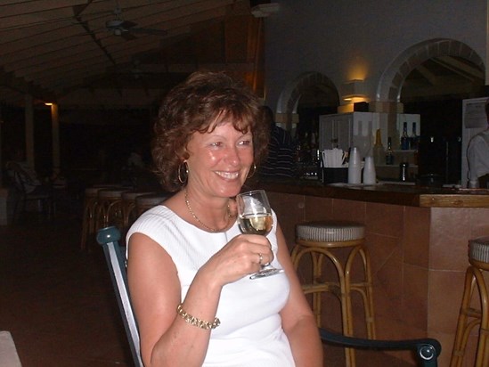 Enjoying a glass of wine in Barbados