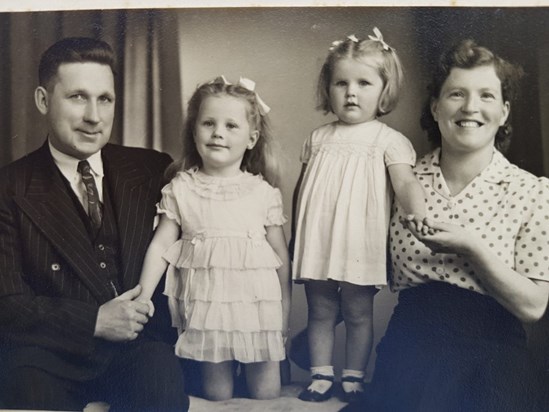 1948: with her parents and sister Eileen, Saltcoats, Scotland