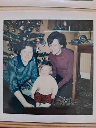 1976: "Kathleen helped put up + decorate the Xmas tree before going home for Xmas"