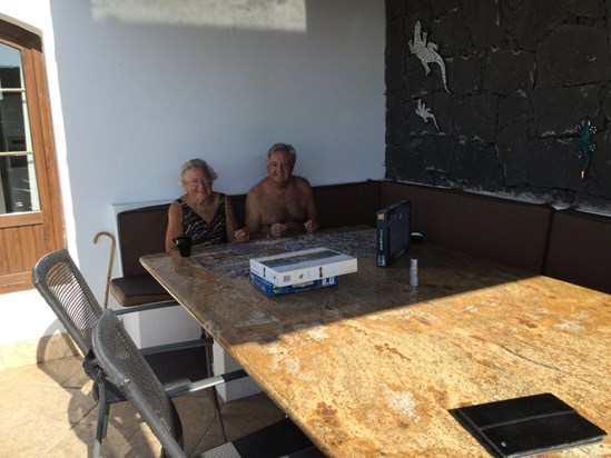 Mum and Ian enjoying one of their many jigsaws - Oceans, Playa Blanca. 