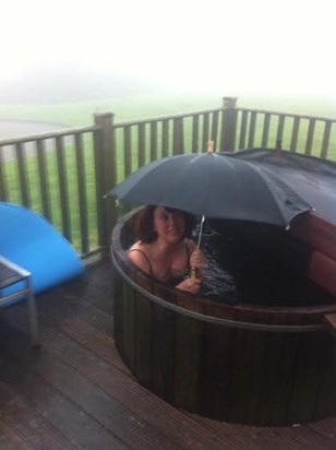 Terry in hot tub in rain