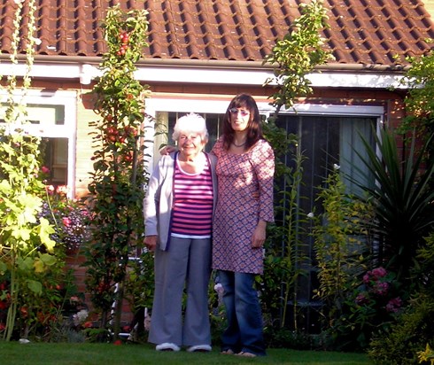 Nana and Petra in the flowery back garden, Mendip Cresent, 2007